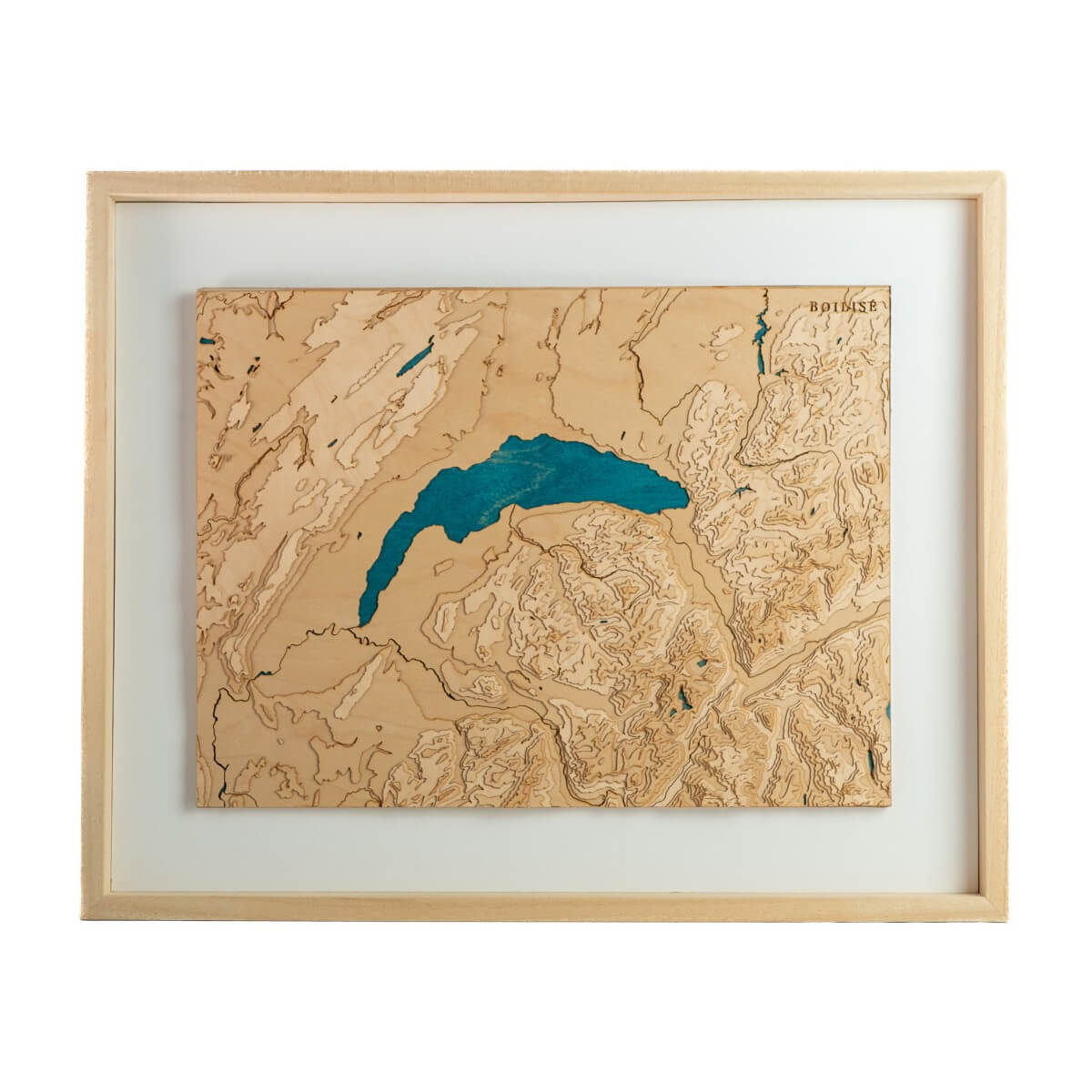 Le lac Léman en relief encadré avec un passe-partout blanc.